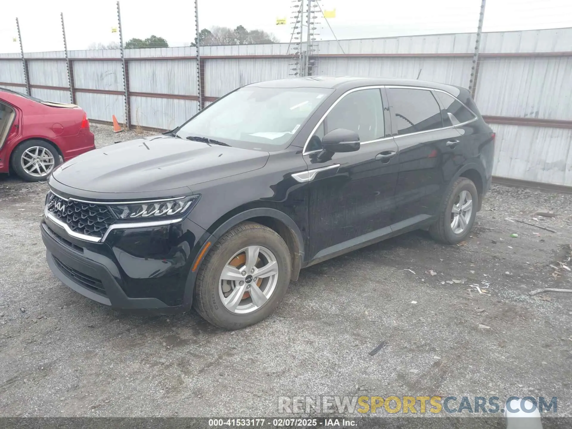2 fotografías del automóvil dañado 5XYRG4LC9PG190174 KIA SORENTO 2023