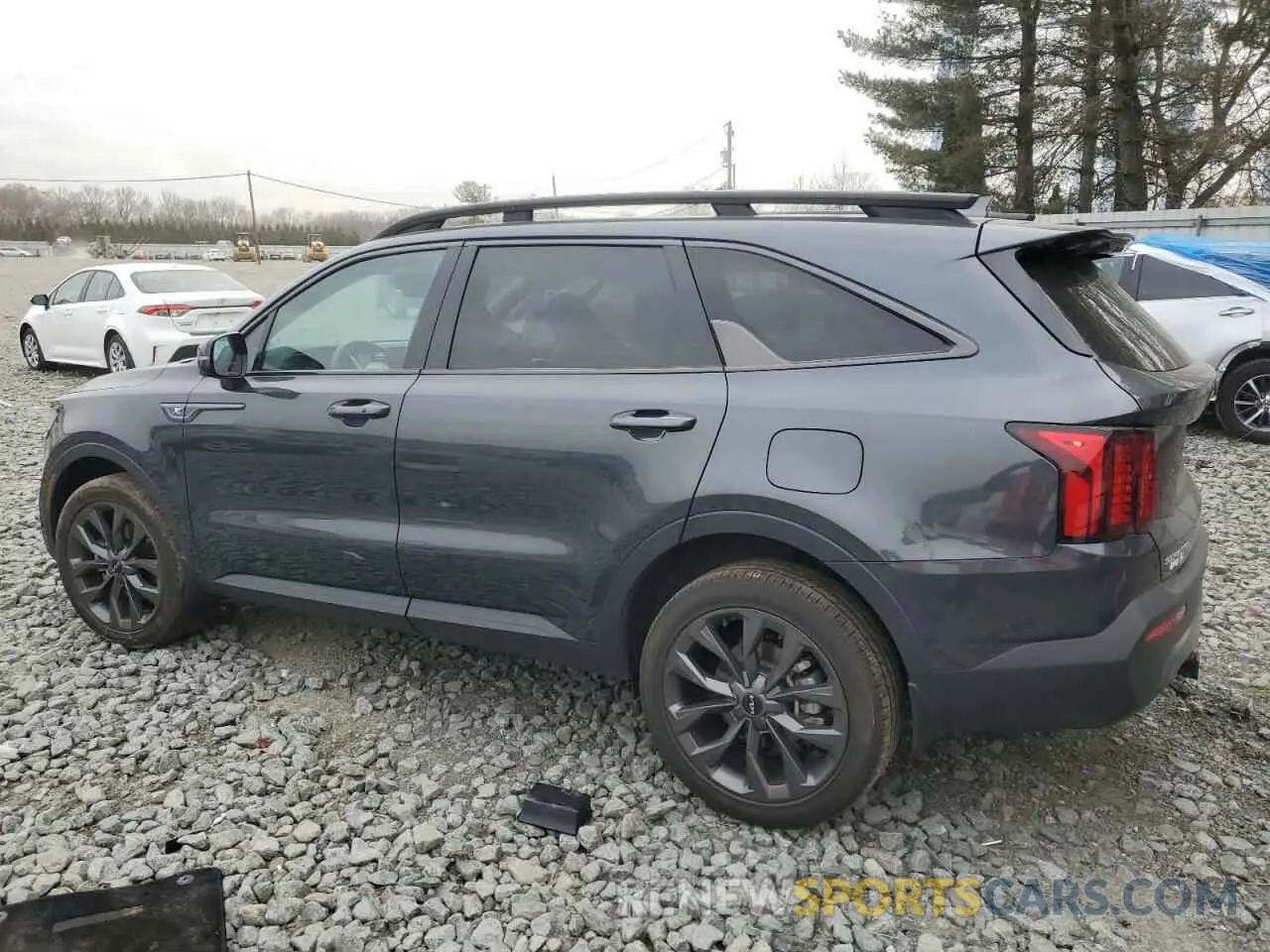 2 fotografías del automóvil dañado 5XYRHDLF9PG248811 KIA SORENTO 2023