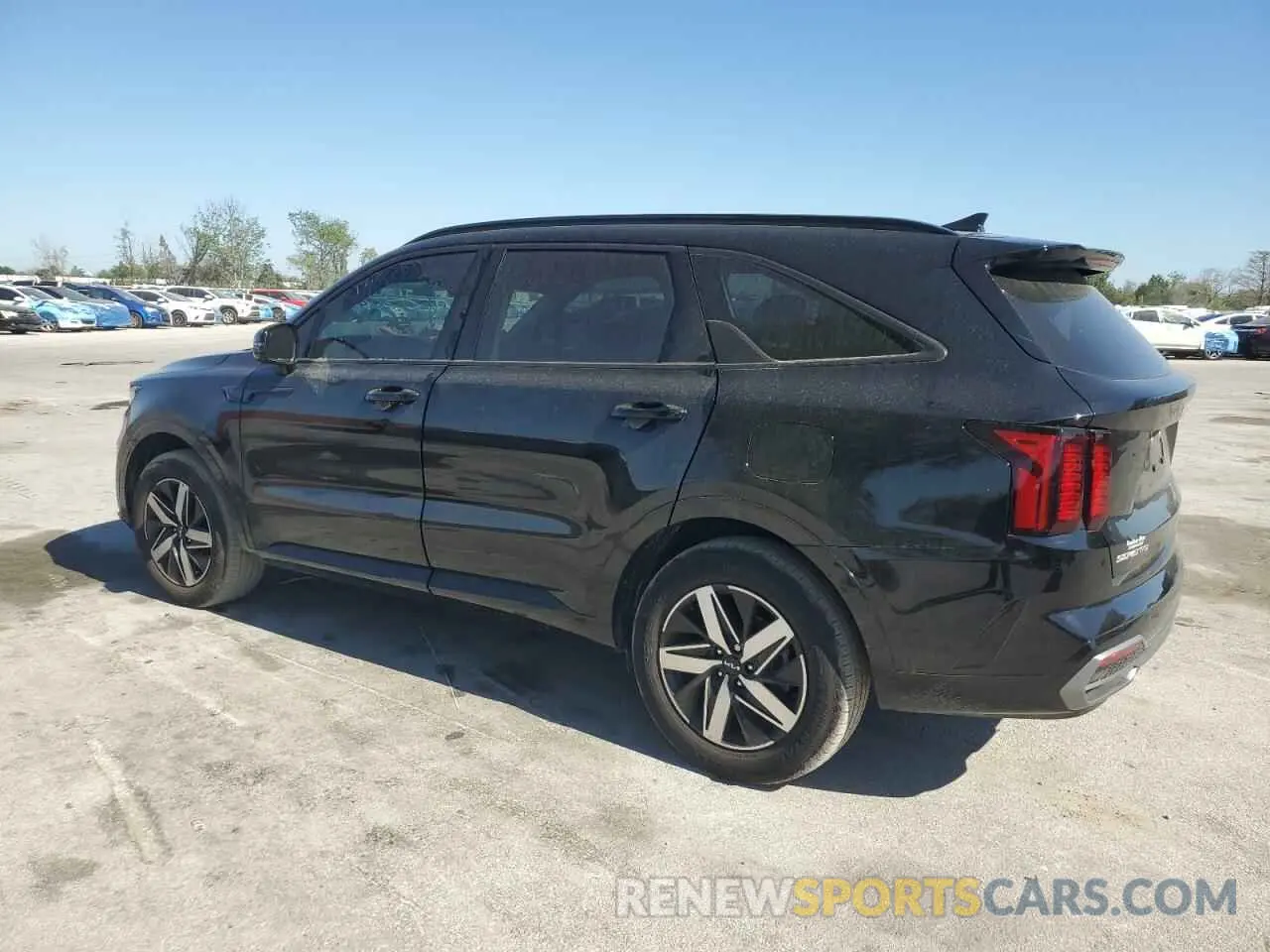 2 fotografías del automóvil dañado 5XYRL4LC4PG242564 KIA SORENTO 2023