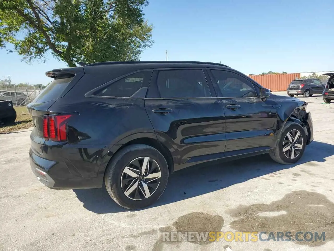 3 fotografías del automóvil dañado 5XYRL4LC4PG242564 KIA SORENTO 2023