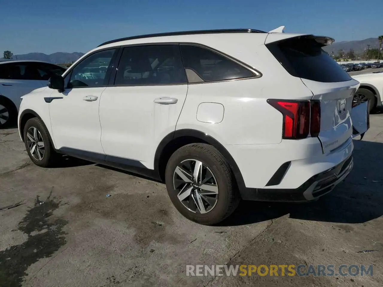 2 fotografías del automóvil dañado 5XYRL4LC5PG208066 KIA SORENTO 2023