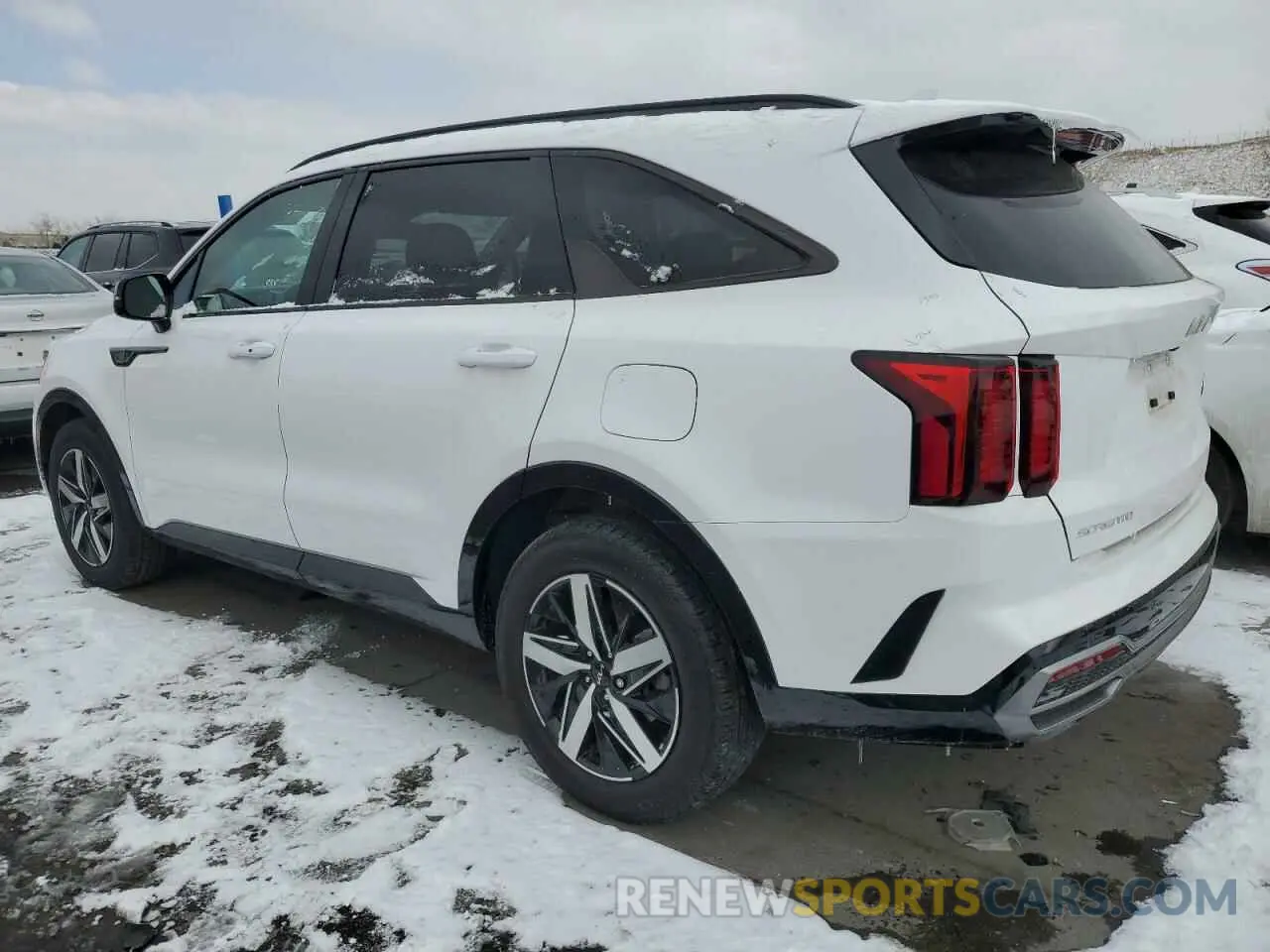 2 fotografías del automóvil dañado 5XYRL4LC9PG216851 KIA SORENTO 2023