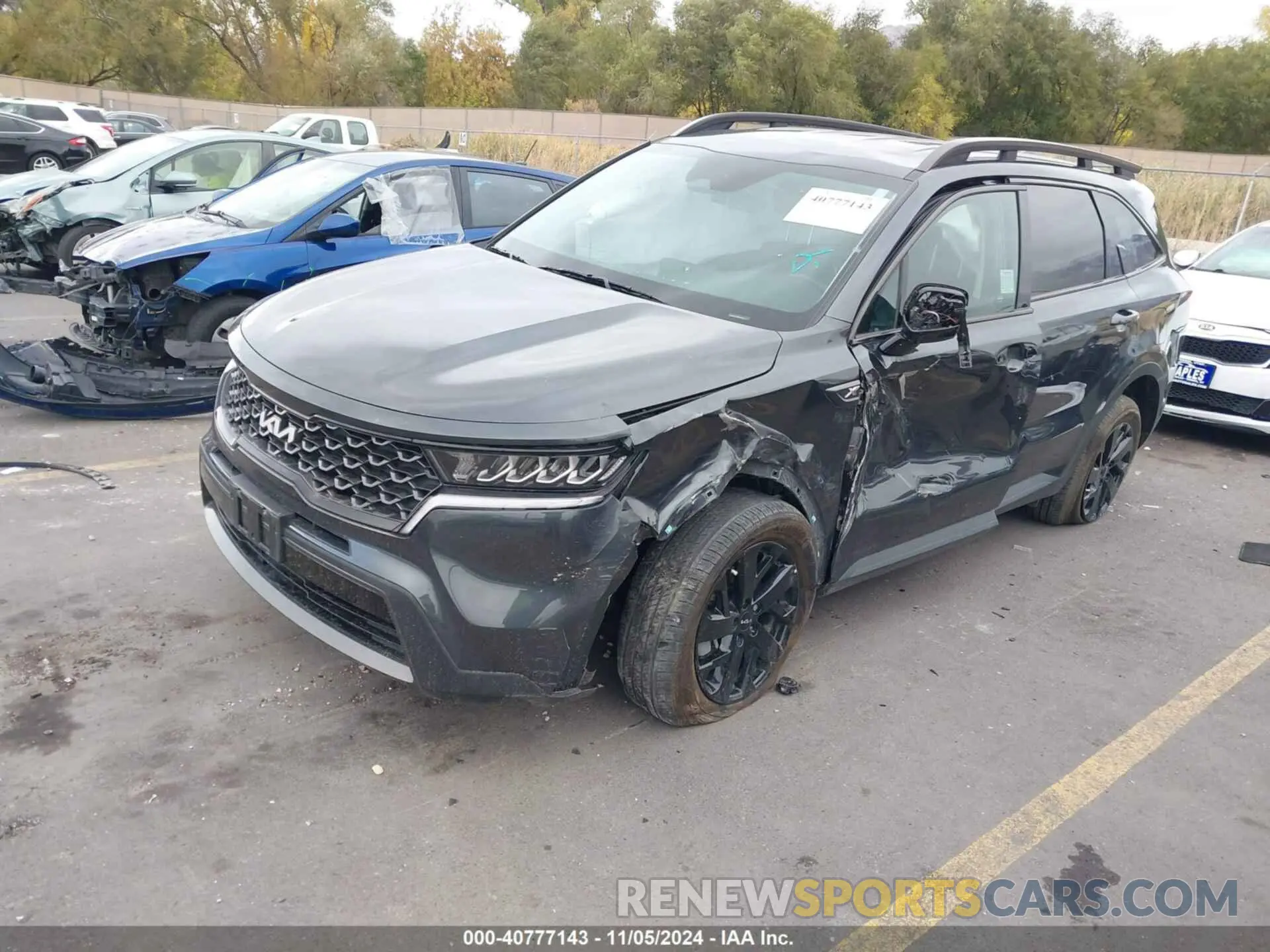 2 fotografías del automóvil dañado 5XYRLDLC3PG218661 KIA SORENTO 2023