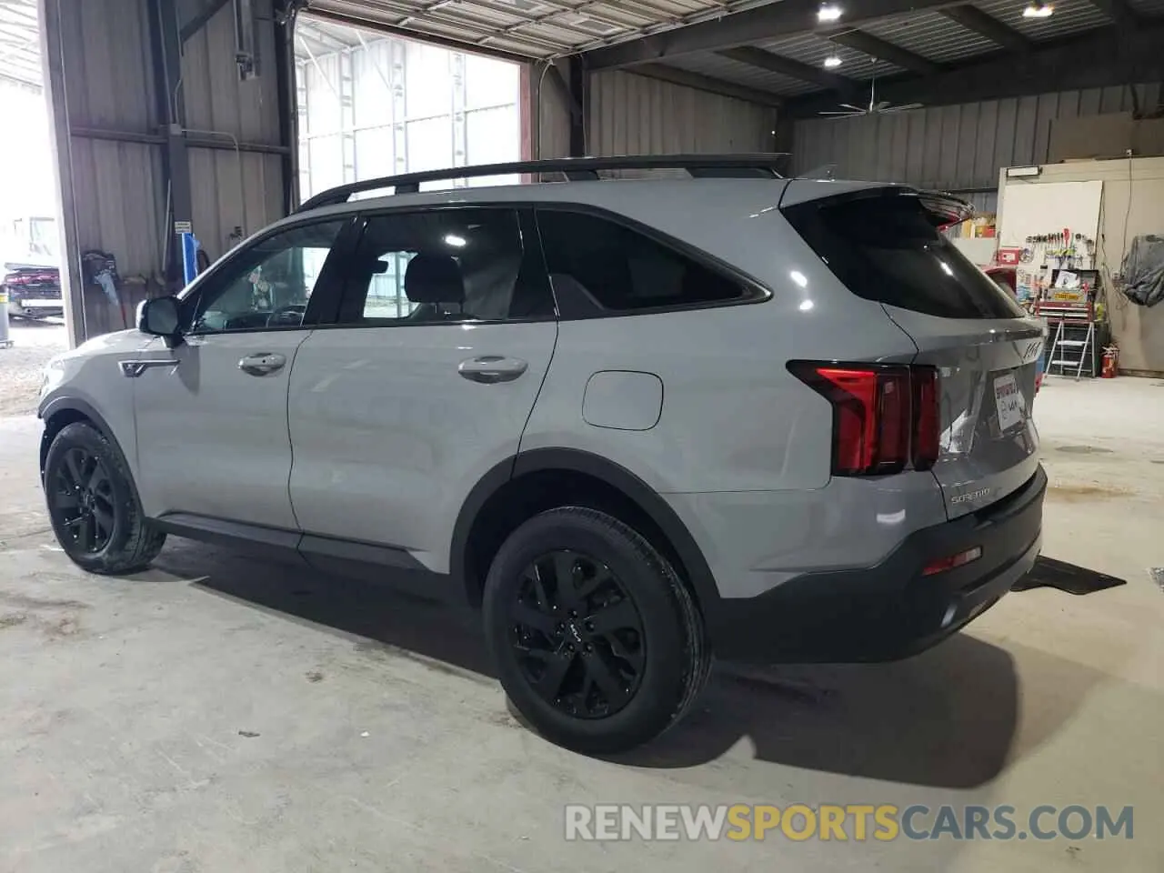 2 fotografías del automóvil dañado 5XYRLDLC4PG222346 KIA SORENTO 2023