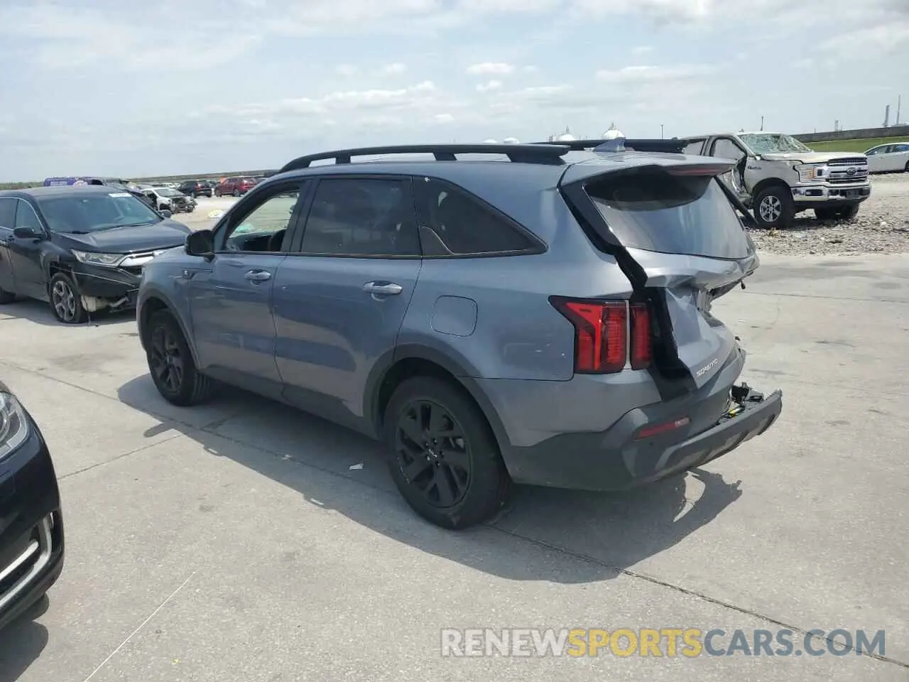 2 fotografías del automóvil dañado 5XYRLDLC8PG161146 KIA SORENTO 2023