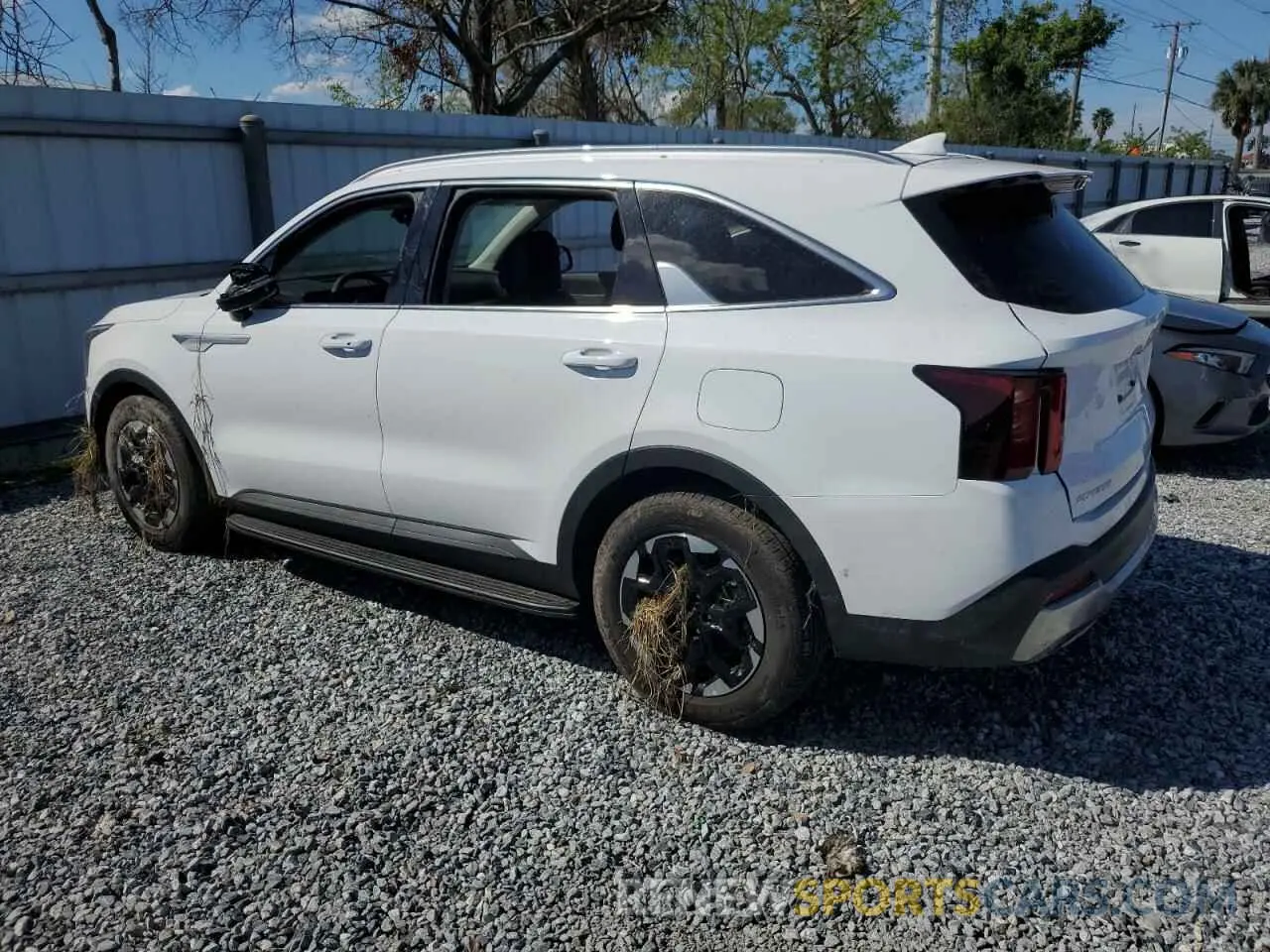 2 fotografías del automóvil dañado 5XYRL4JC2SG340102 KIA SORENTO 2025