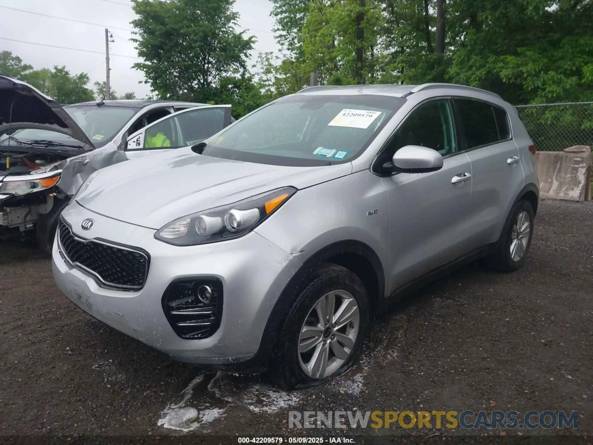 2 fotografías del automóvil dañado KNDPMCAC1K7581368 KIA SPORTAGE 2019