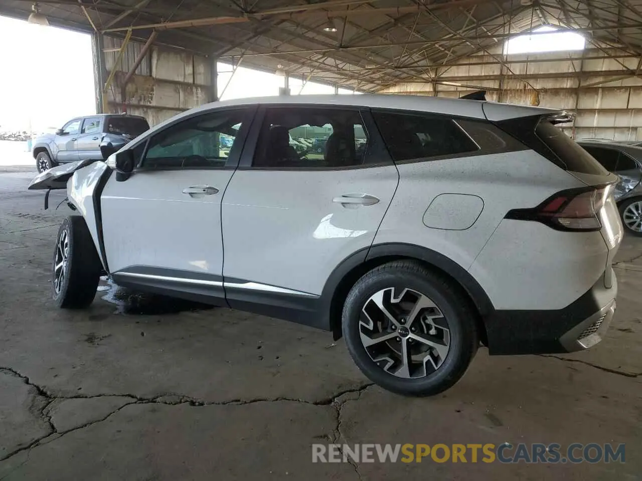 2 fotografías del automóvil dañado 5XYK33AF0PG108076 KIA SPORTAGE 2023