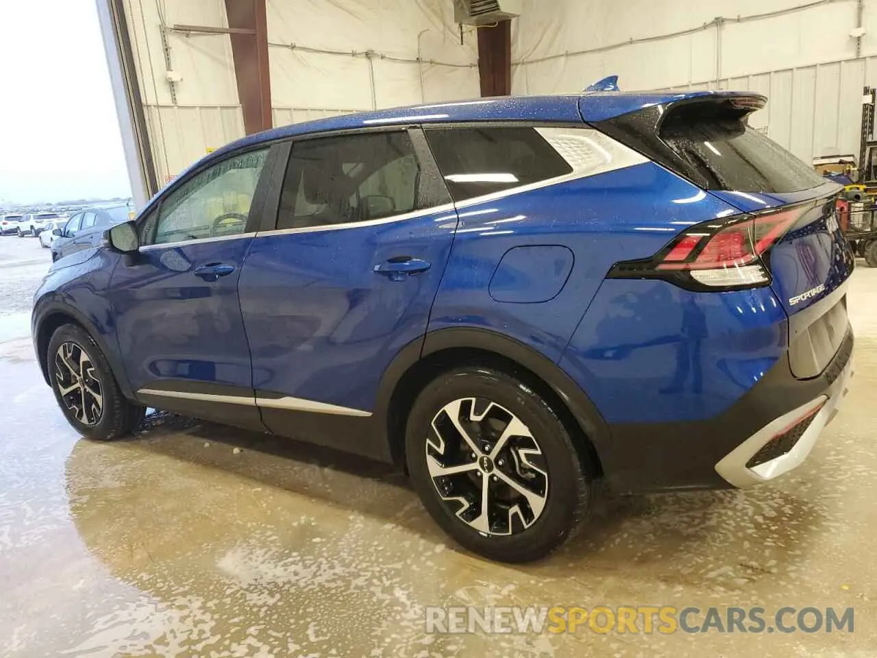 2 fotografías del automóvil dañado 5XYK33AF5PG103990 KIA SPORTAGE 2023
