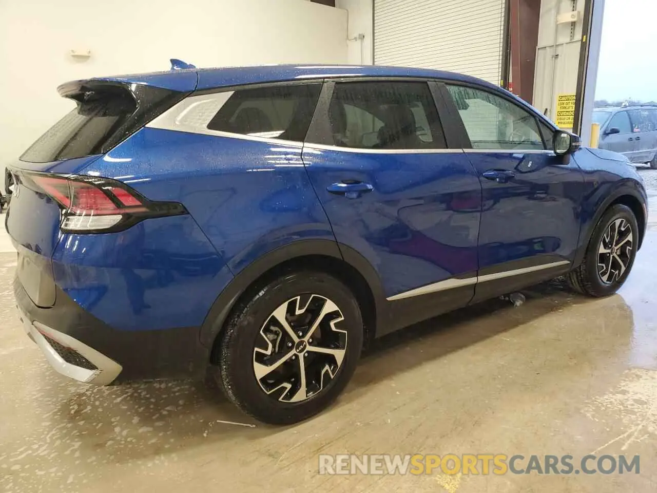 3 fotografías del automóvil dañado 5XYK33AF5PG103990 KIA SPORTAGE 2023