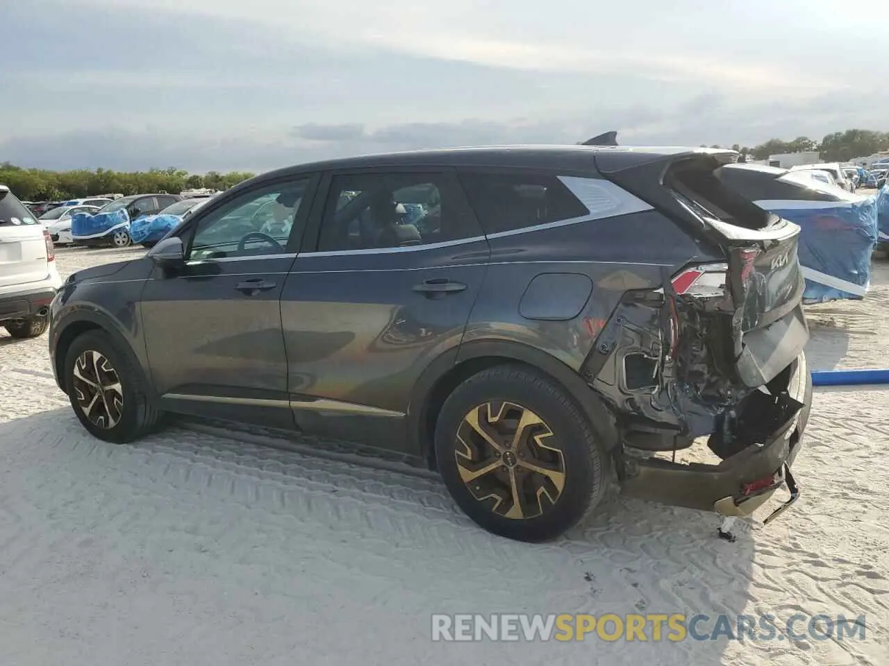 2 fotografías del automóvil dañado 5XYK33AF9PG067172 KIA SPORTAGE 2023