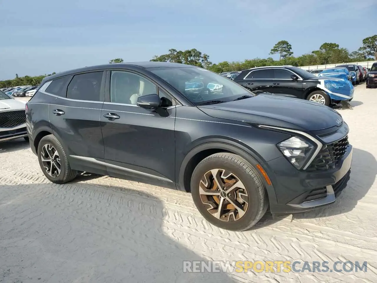 4 fotografías del automóvil dañado 5XYK33AF9PG067172 KIA SPORTAGE 2023