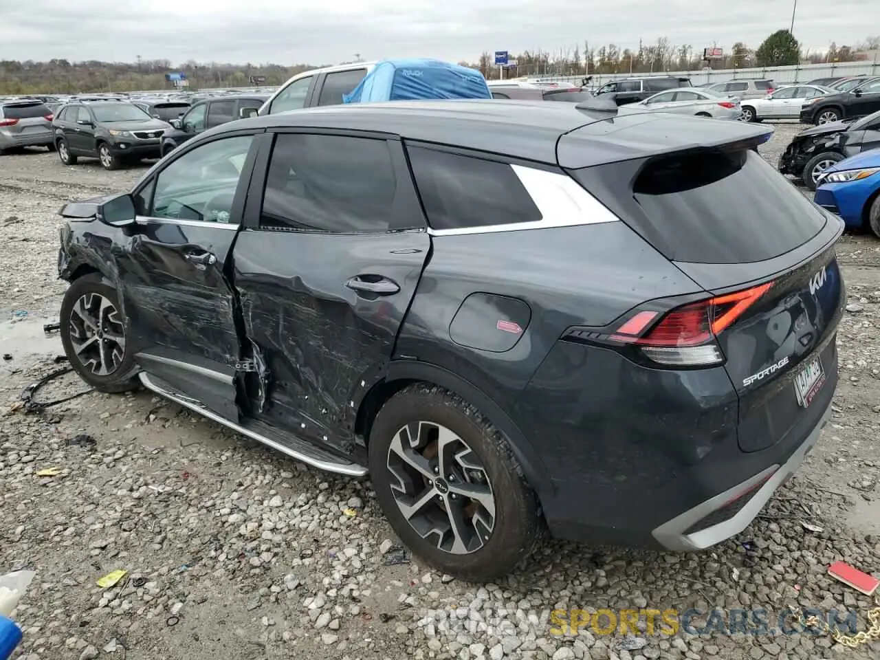 2 fotografías del automóvil dañado 5XYK33AFXPG097474 KIA SPORTAGE 2023