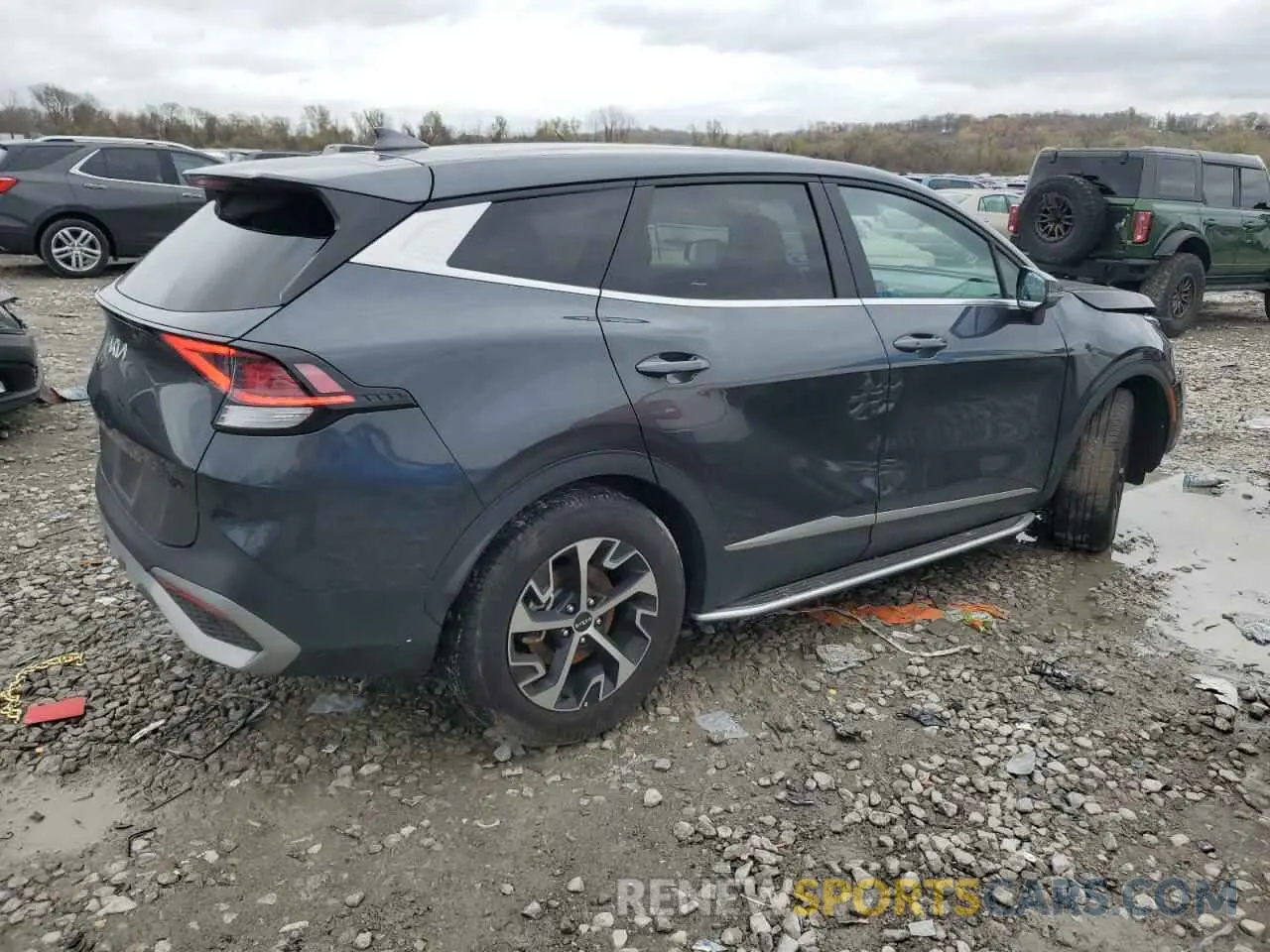 3 fotografías del automóvil dañado 5XYK33AFXPG097474 KIA SPORTAGE 2023