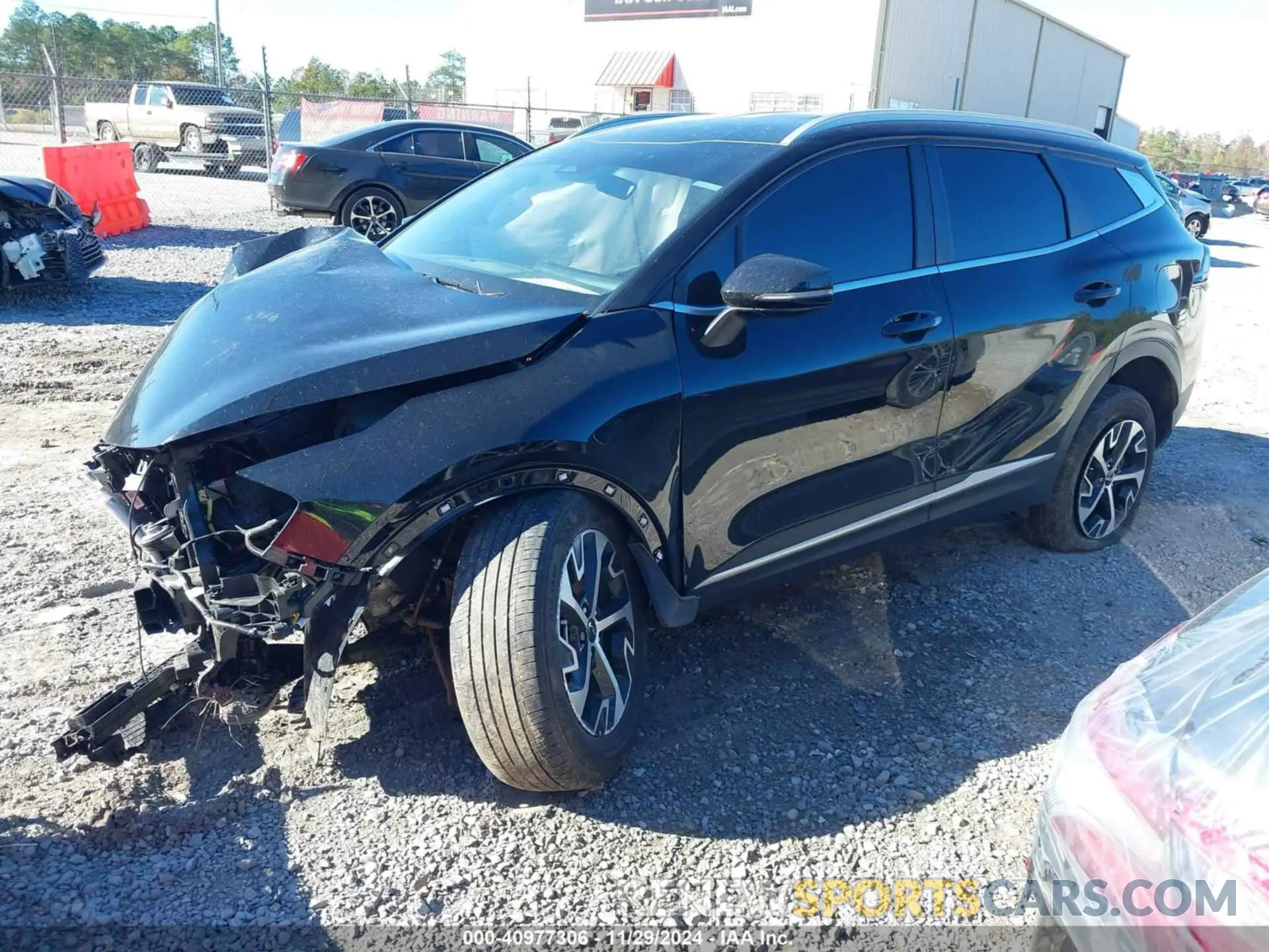 2 fotografías del automóvil dañado 5XYK3CAF8PG126342 KIA SPORTAGE 2023