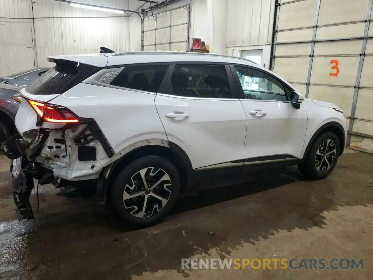 3 fotografías del automóvil dañado 5XYK3CAF9PG113602 KIA SPORTAGE 2023
