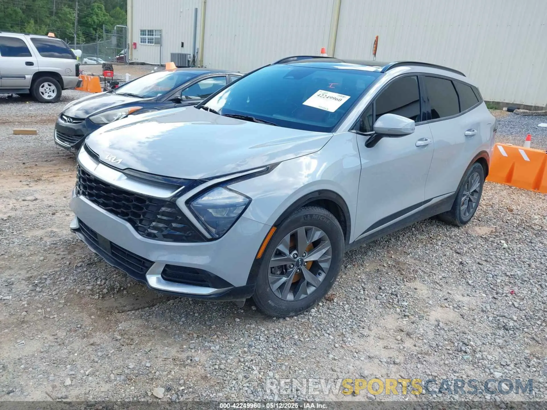 2 fotografías del automóvil dañado 5XYK43AF8PG077611 KIA SPORTAGE 2023