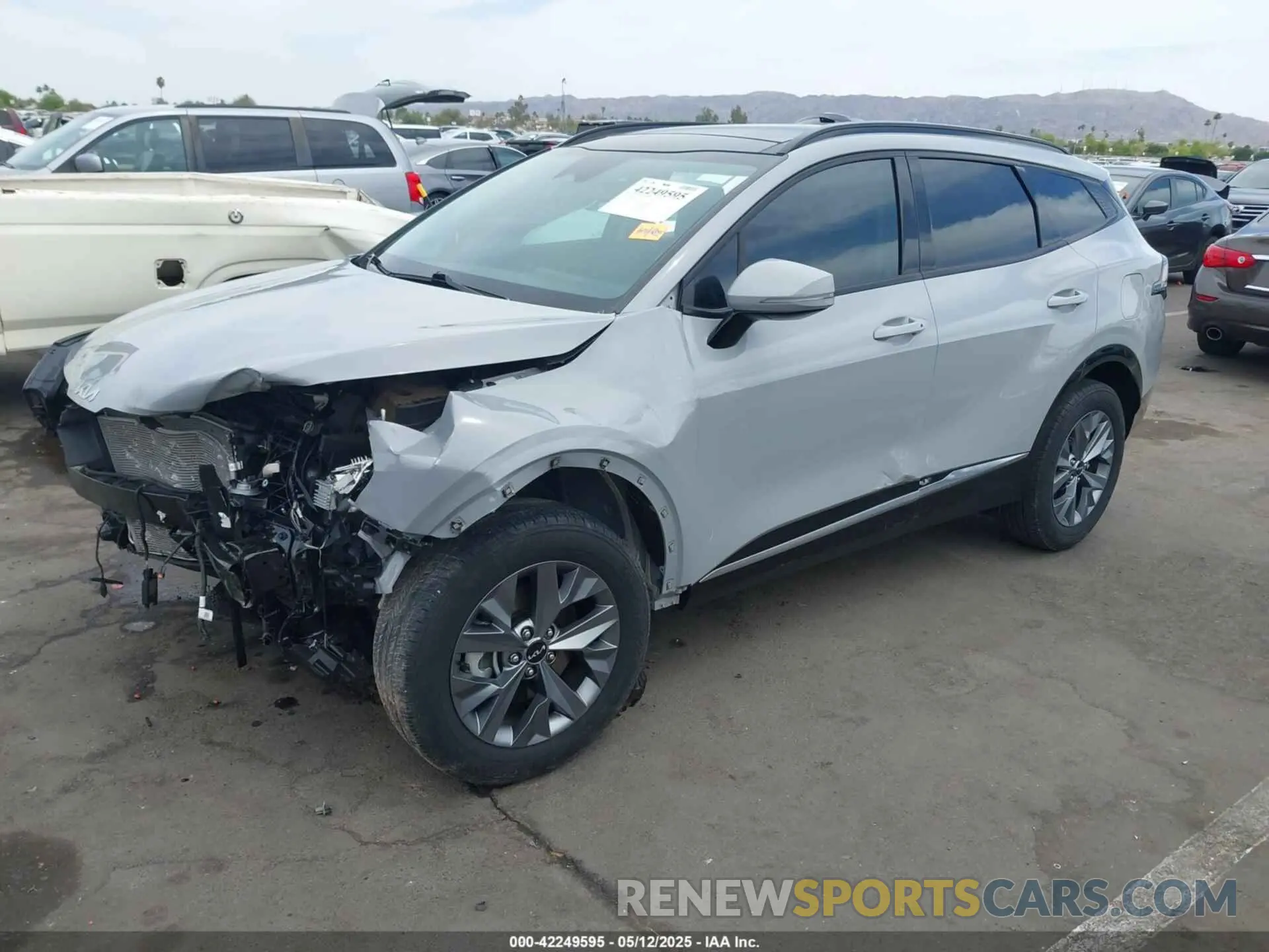 2 fotografías del automóvil dañado 5XYK4CAF1PG081161 KIA SPORTAGE 2023