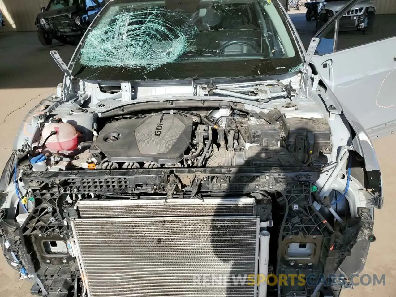 11 fotografías del automóvil dañado 5XYK53AF0PG013205 KIA SPORTAGE 2023