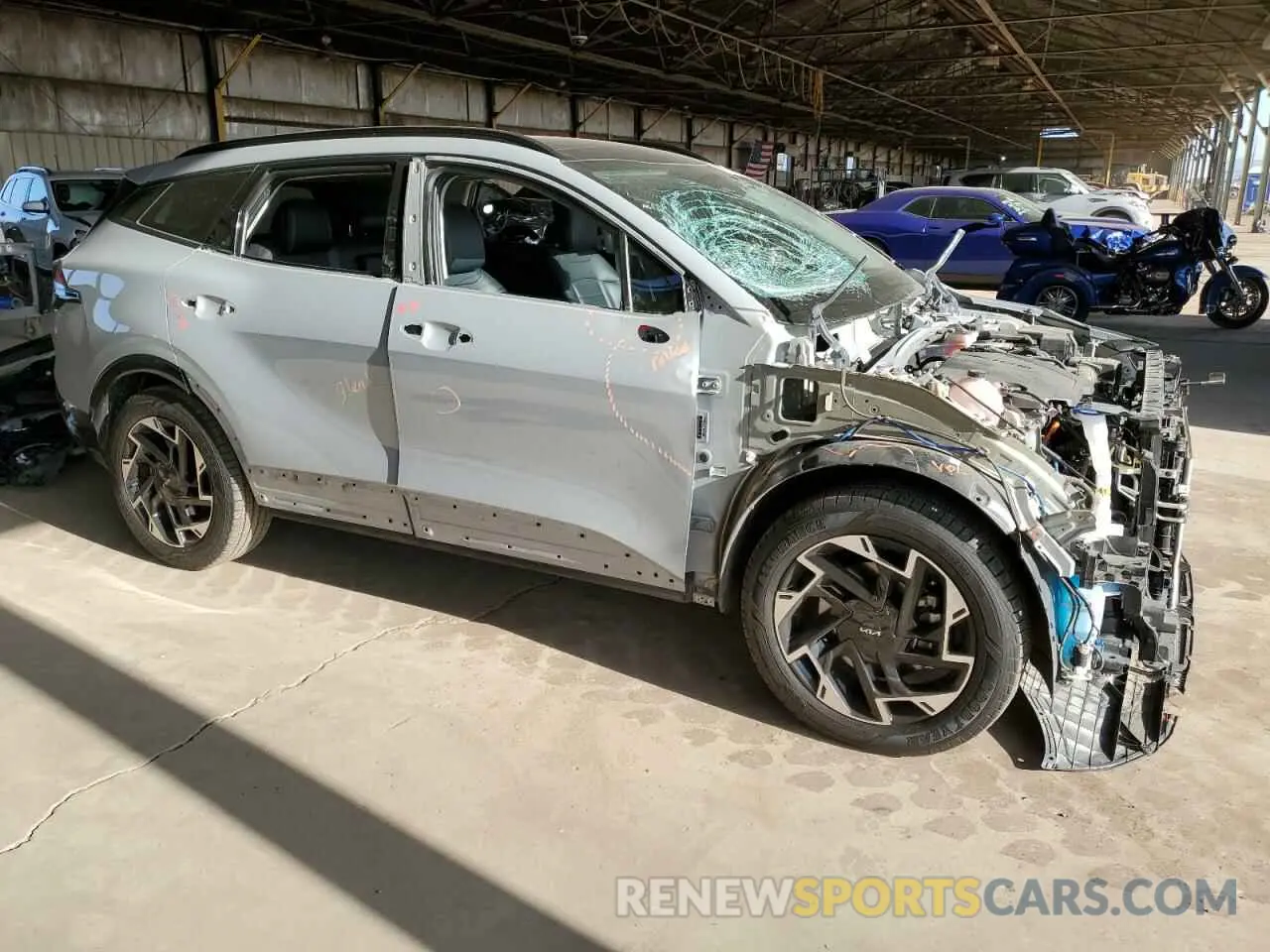 4 fotografías del automóvil dañado 5XYK53AF0PG013205 KIA SPORTAGE 2023