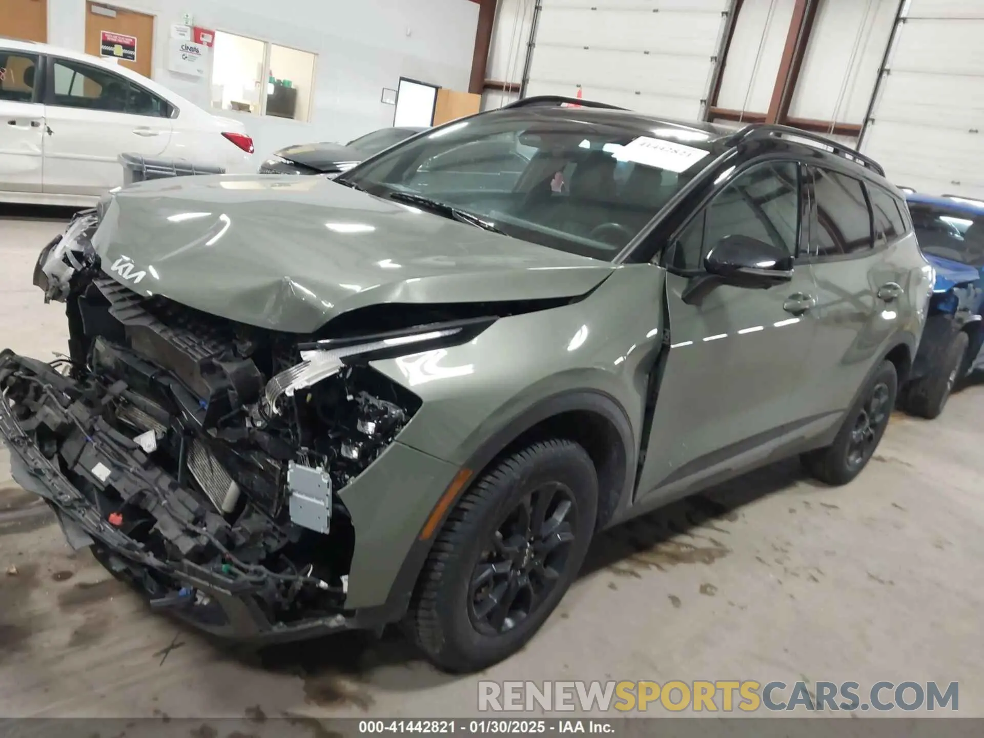 2 fotografías del automóvil dañado 5XYK7CAF2PG124221 KIA SPORTAGE 2023