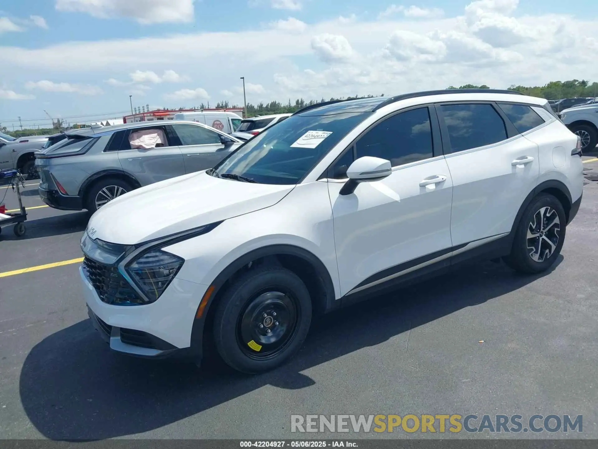 2 fotografías del automóvil dañado 5XYK33DF2SG311085 KIA SPORTAGE 2025