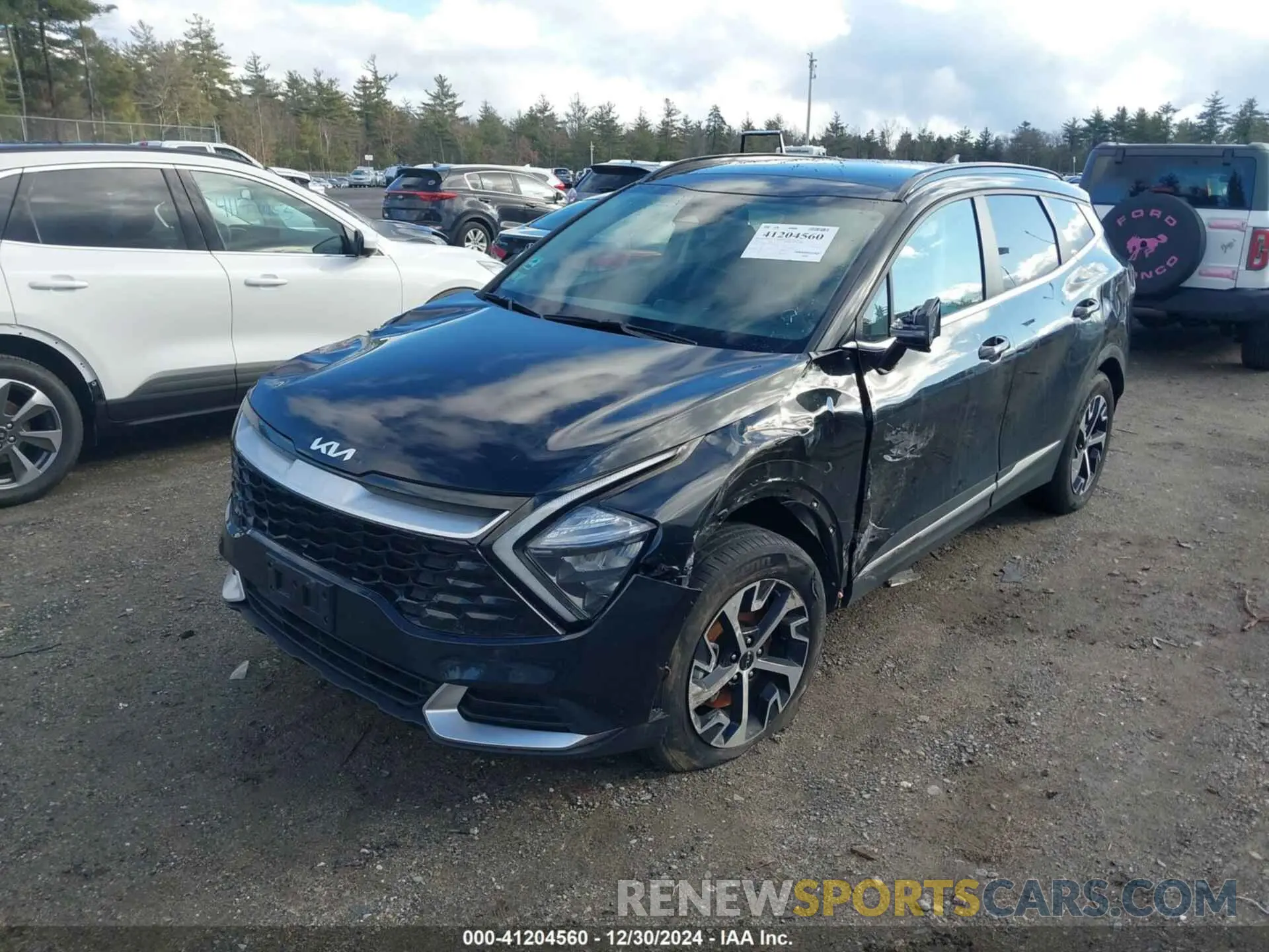 2 fotografías del automóvil dañado KNDPVCAG0P7056552 KIA SPORTAGE HYBRID 2023