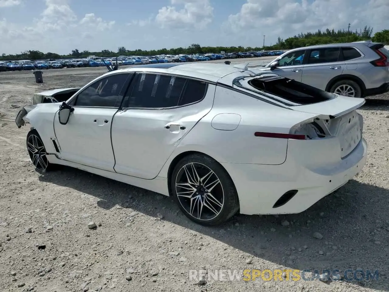 2 fotografías del automóvil dañado KNAE55LC2P6134667 KIA STINGER 2023