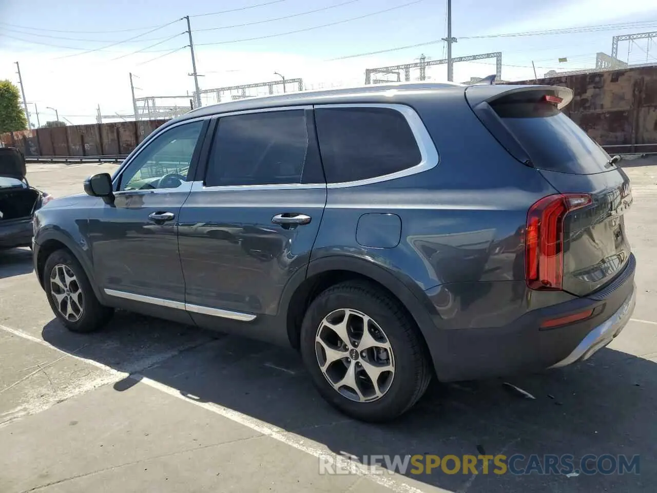 2 fotografías del automóvil dañado 5XYP34HC5NG282889 KIA TELLURIDE 2022