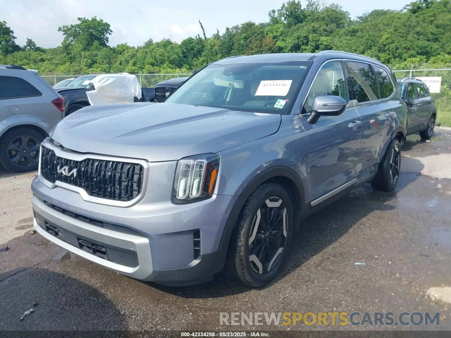 2 fotografías del automóvil dañado 5XYP34GC6PG382858 KIA TELLURIDE 2023