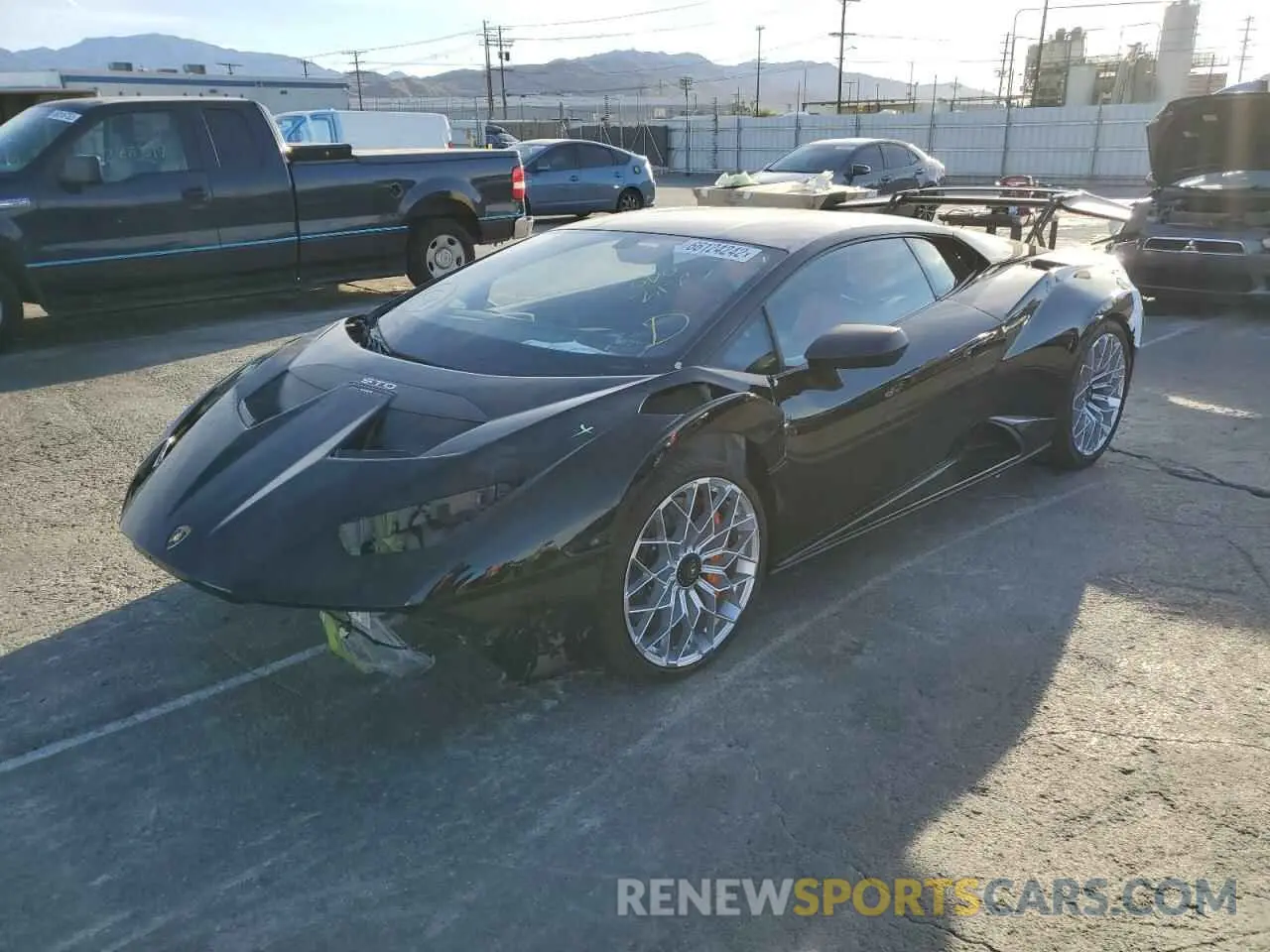2 fotografías del automóvil dañado ZHWUA6ZX9NLA18448 LAMBORGHINI HURACAN ST 2022
