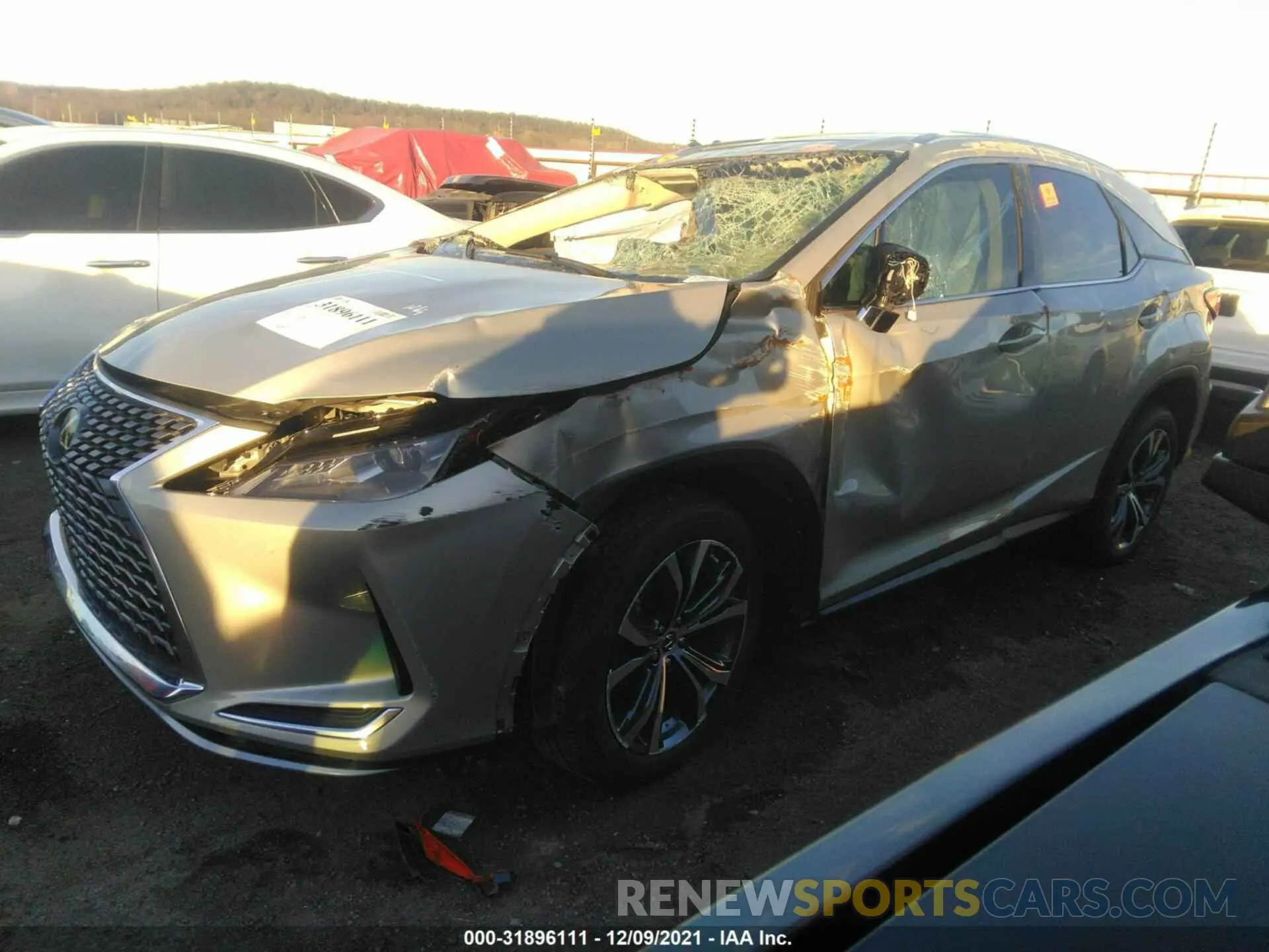 2 fotografías del automóvil dañado 2T2HZMAA0MC198285 LEXUS RX 2021