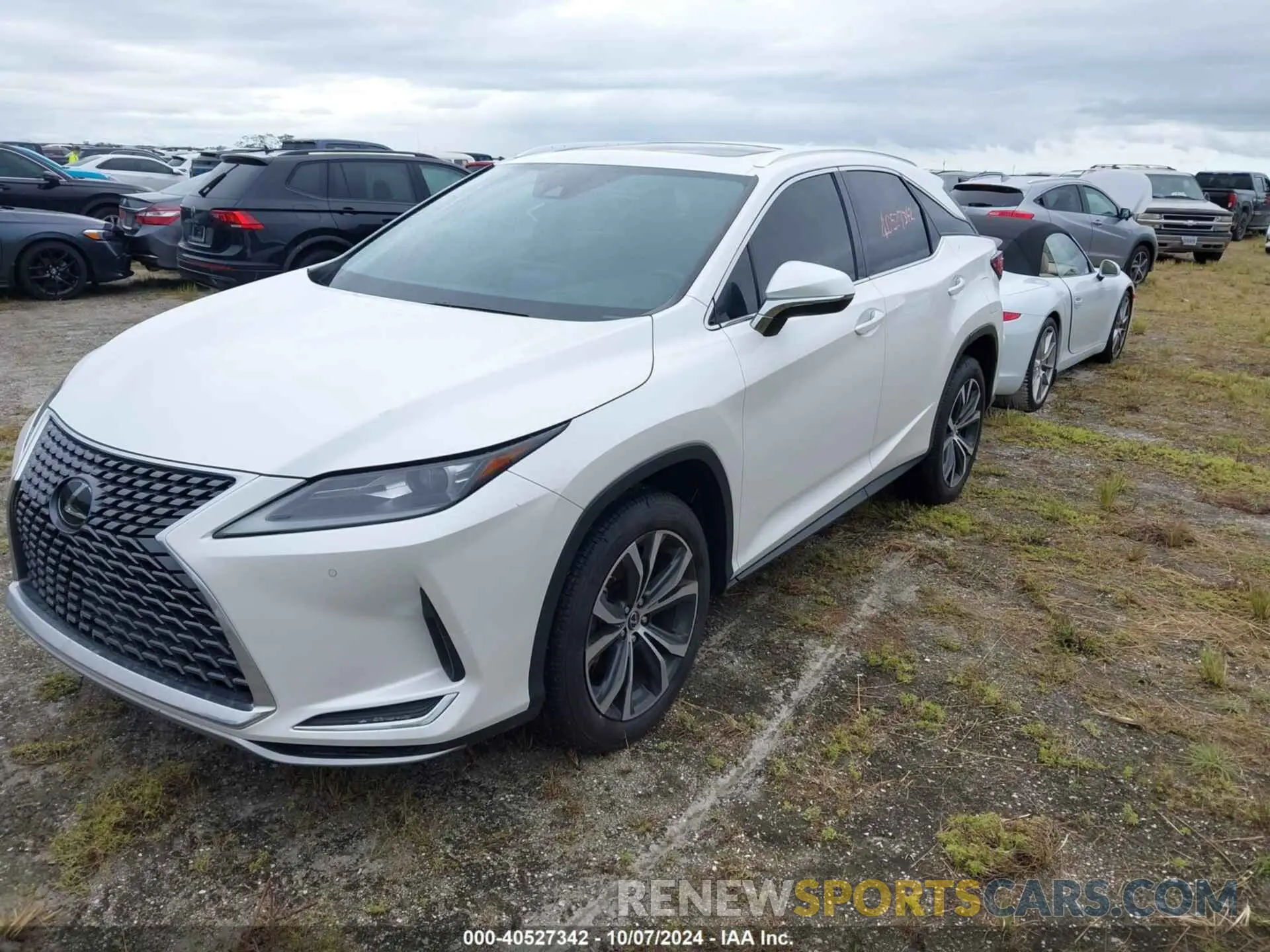 2 fotografías del automóvil dañado 2T2HZMAA2MC183075 LEXUS RX 2021