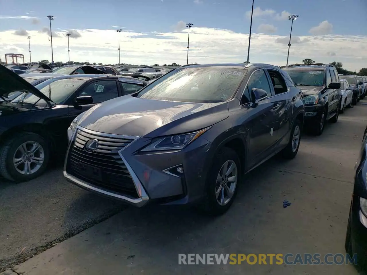 2 fotografías del automóvil dañado 2T2BZMCA4KC178671 LEXUS RX350 2019