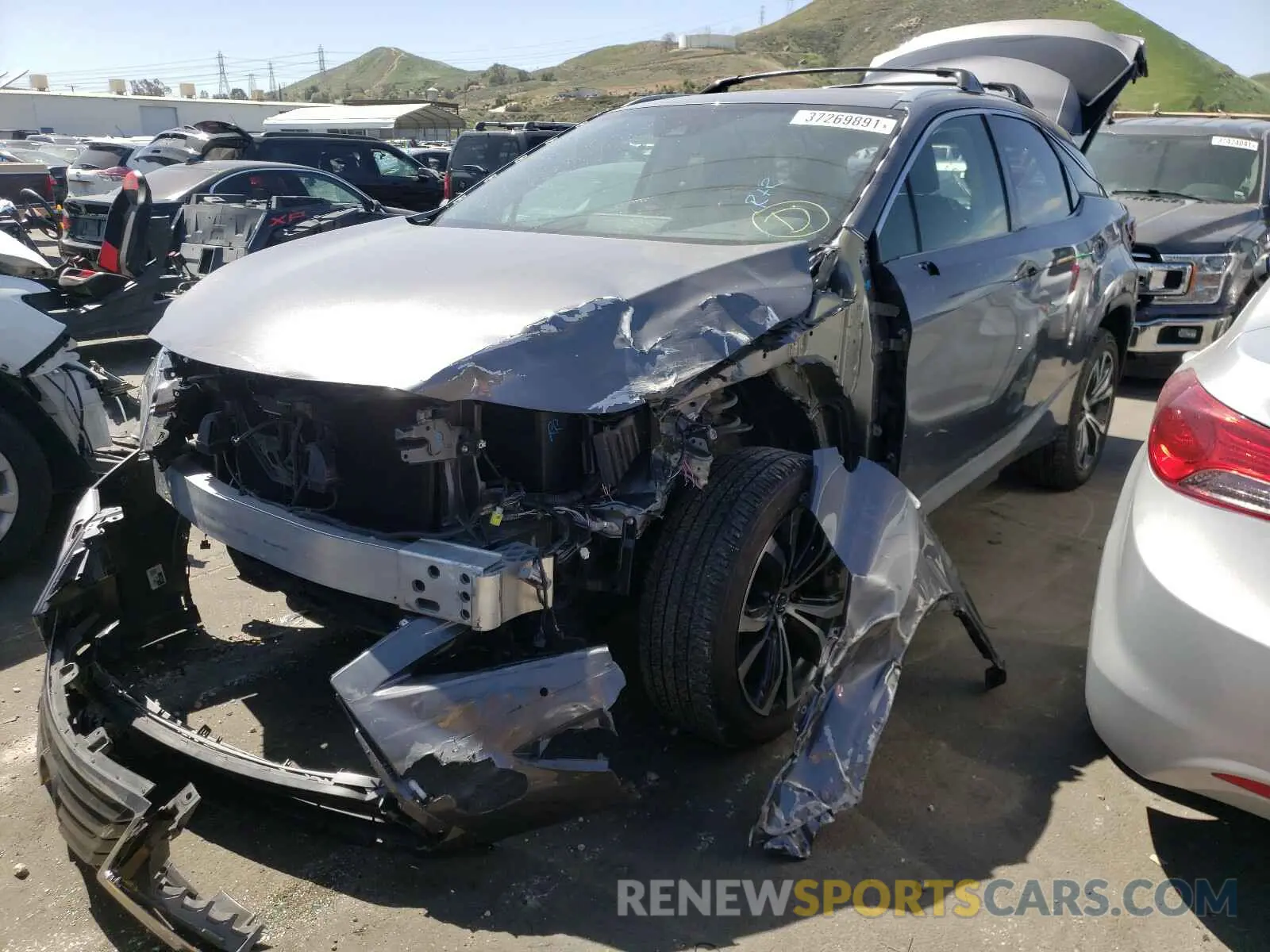 2 fotografías del automóvil dañado 2T2BZMCA5KC168201 LEXUS RX350 2019