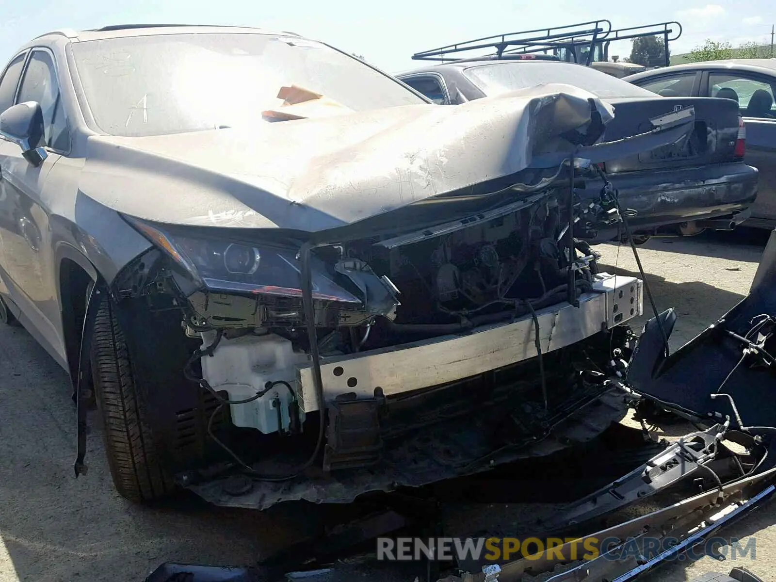 10 fotografías del automóvil dañado 2T2BGMCAXKC036119 LEXUS RX450 2019