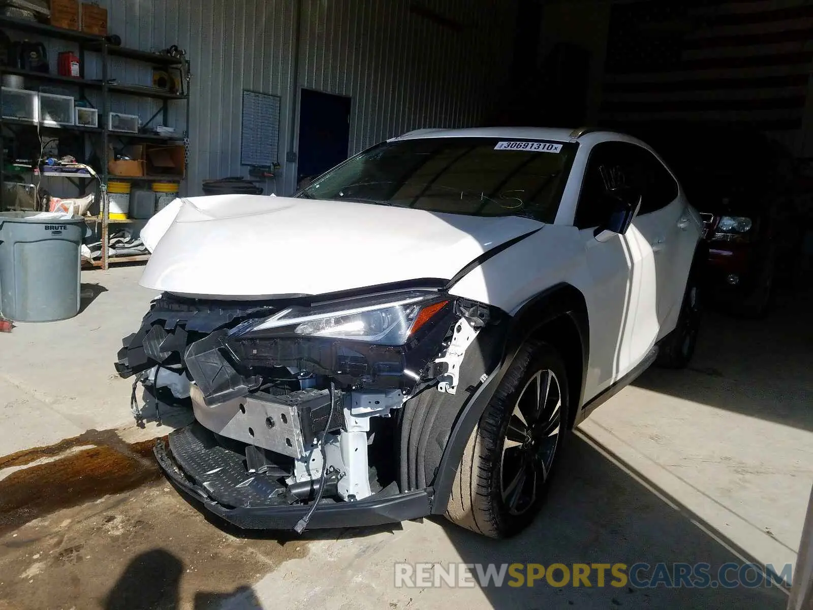 2 fotografías del automóvil dañado JTHY3JBH1K2001229 LEXUS UX 200 2019
