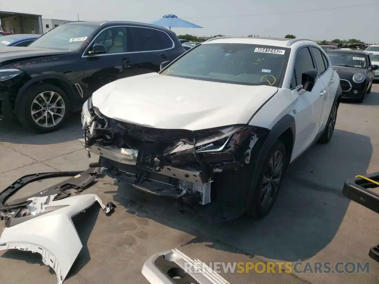 2 fotografías del automóvil dañado JTHY3JBHXK2005330 LEXUS UX 200 2019