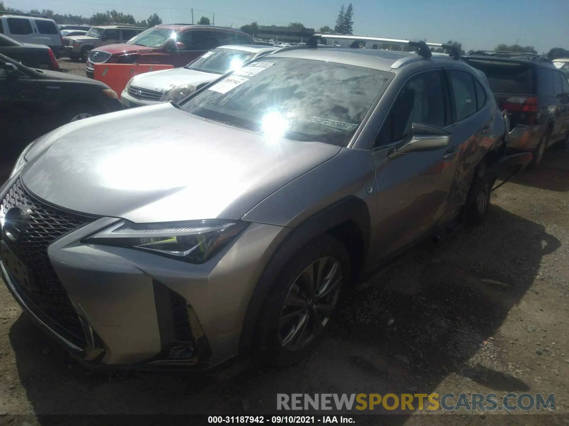 2 fotografías del automóvil dañado JTHY3JBH1K2017110 LEXUS UX 2019