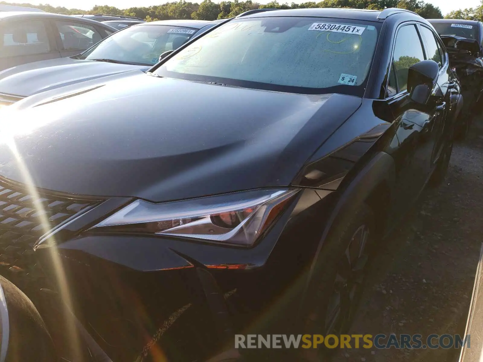 2 fotografías del automóvil dañado JTHU9JBHXK2006541 LEXUS UX 250H 2019