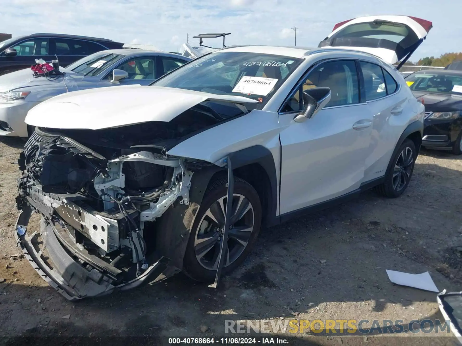 2 fotografías del automóvil dañado JTHP9JBH3M2054074 LEXUS UX 250H 2021