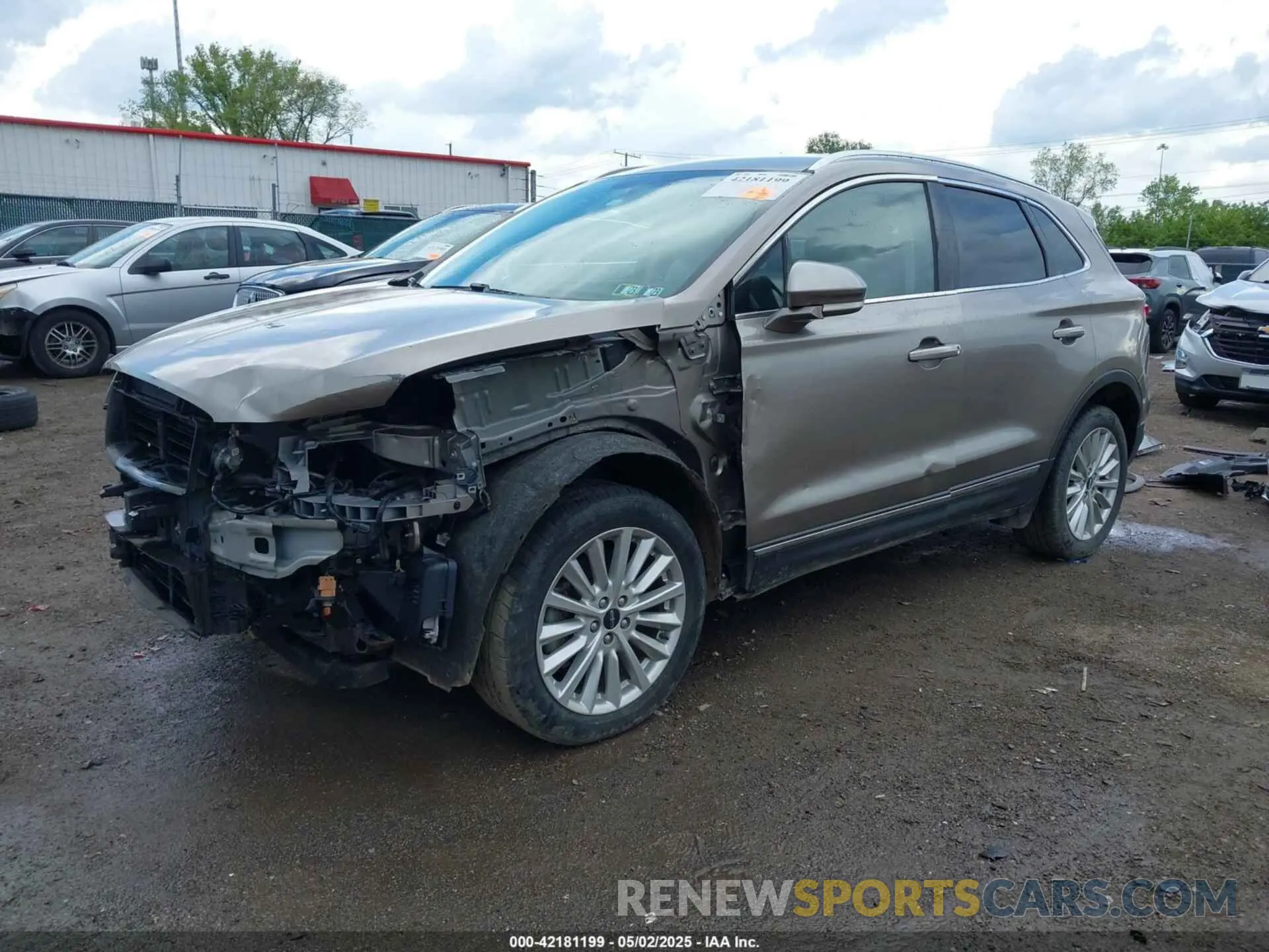 2 fotografías del automóvil dañado 5LMCJ1D97KUL39481 LINCOLN MKC 2019