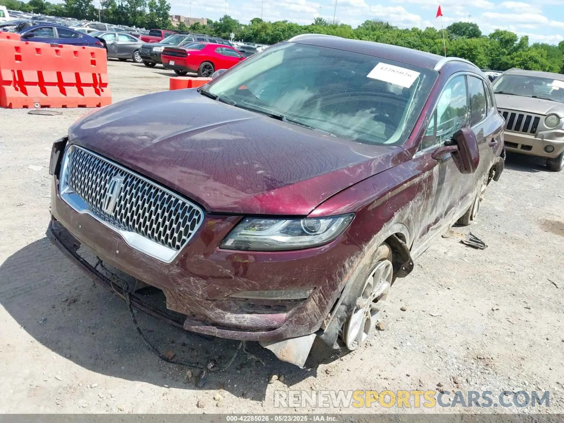2 fotografías del automóvil dañado 5LMCJ2C96KUL17527 LINCOLN MKC 2019