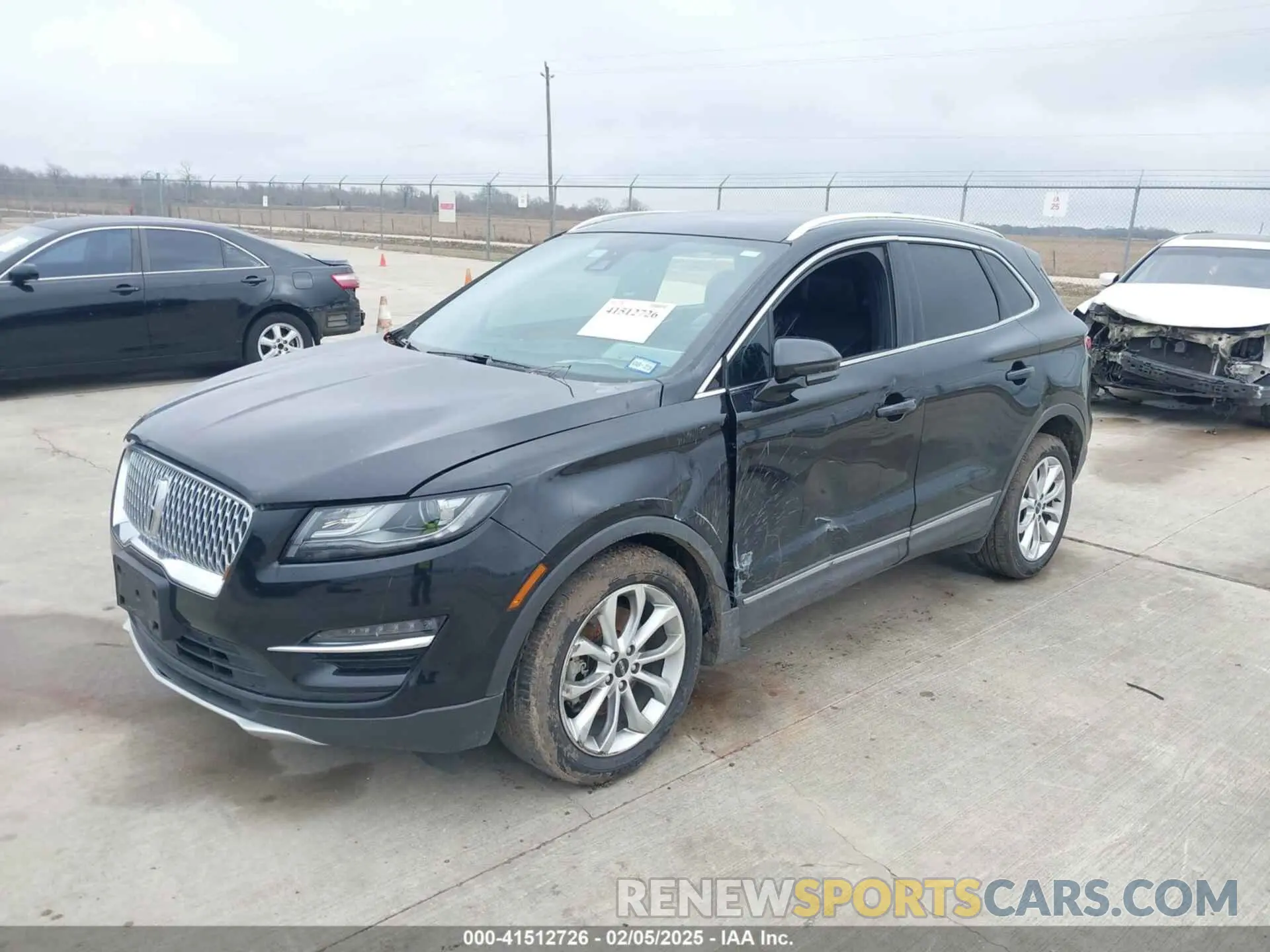 2 fotografías del automóvil dañado 5LMCJ2C99KUL52725 LINCOLN MKC 2019