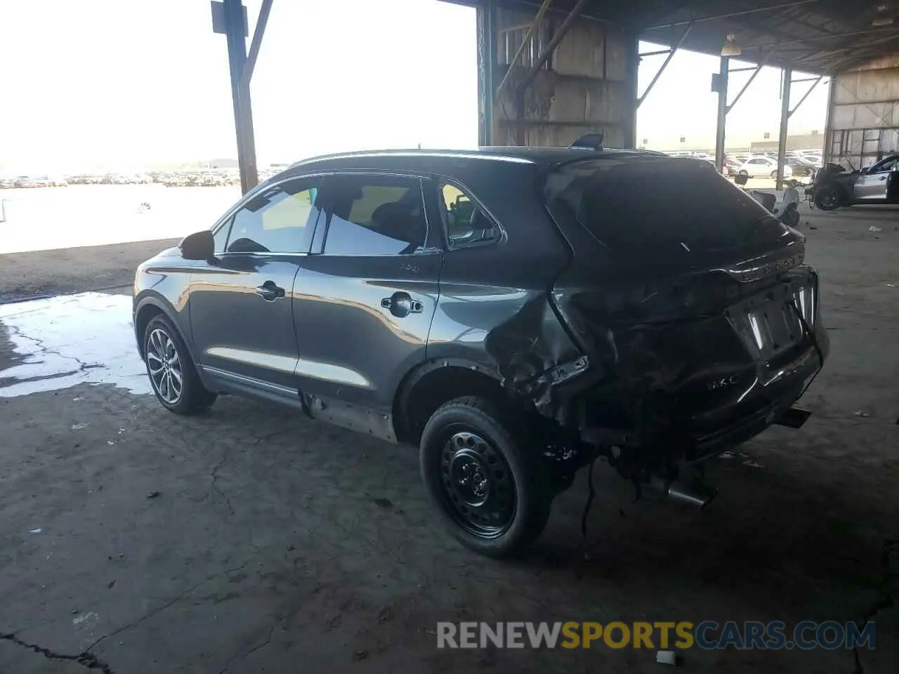 2 fotografías del automóvil dañado 5LMCJ2D94KUL45387 LINCOLN MKC 2019