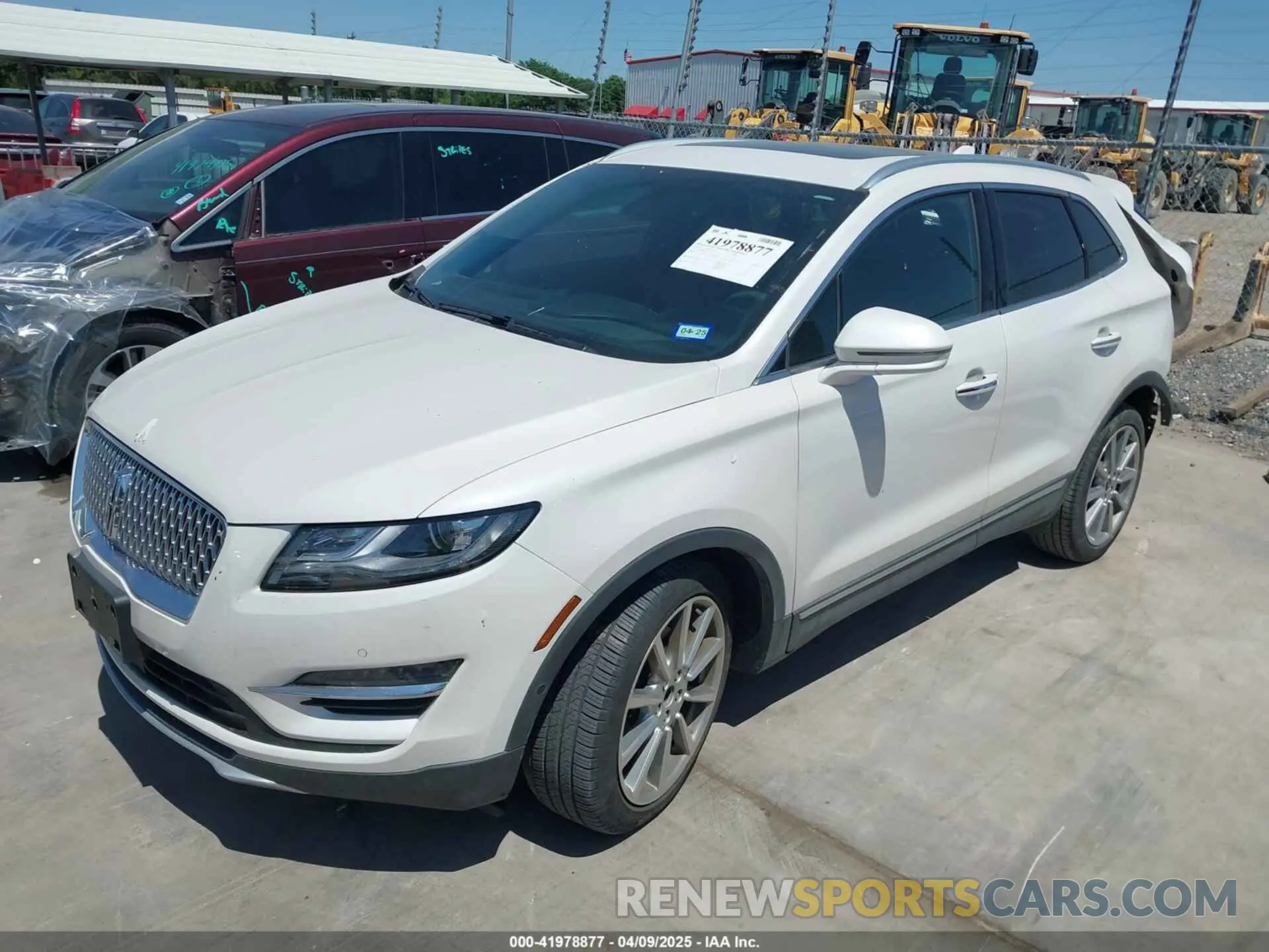 2 fotografías del automóvil dañado 5LMCJ3C93KUL35294 LINCOLN MKC 2019