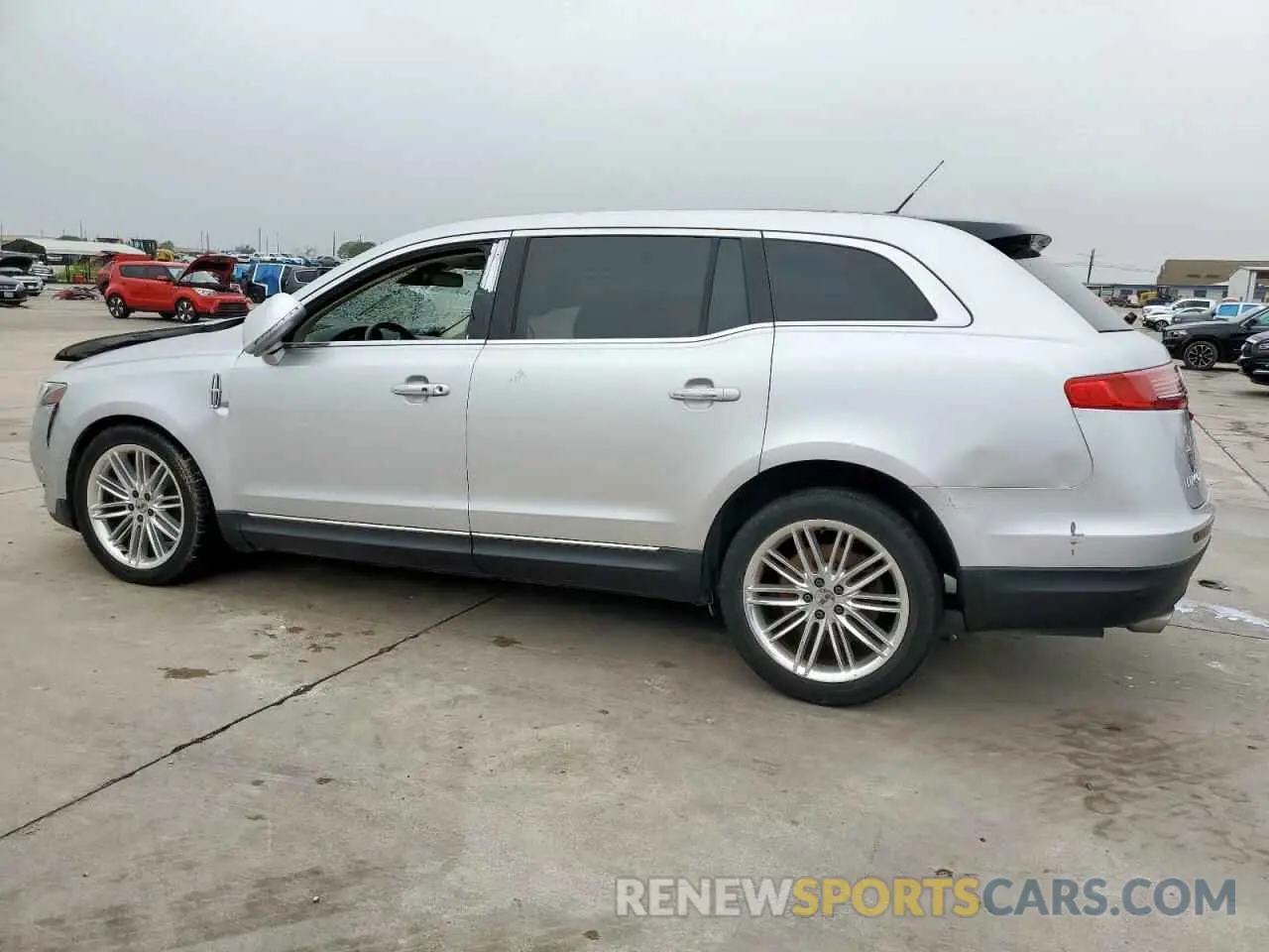 2 fotografías del automóvil dañado 2LMHJ5AT9KBL02765 LINCOLN MKT 2019