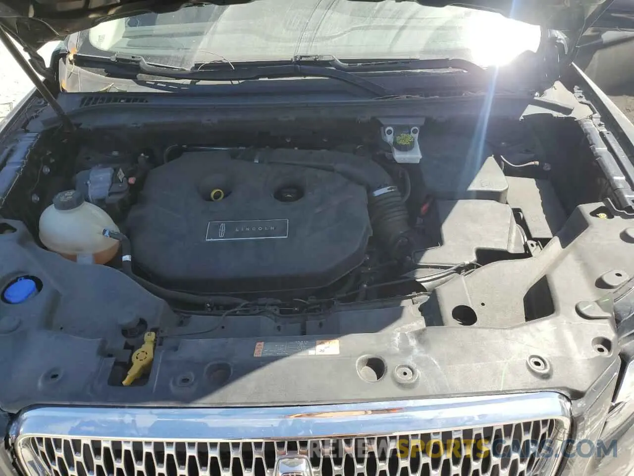 12 fotografías del automóvil dañado 5LMCJ1C95KUL08912 LINCOLN MKZ 2019