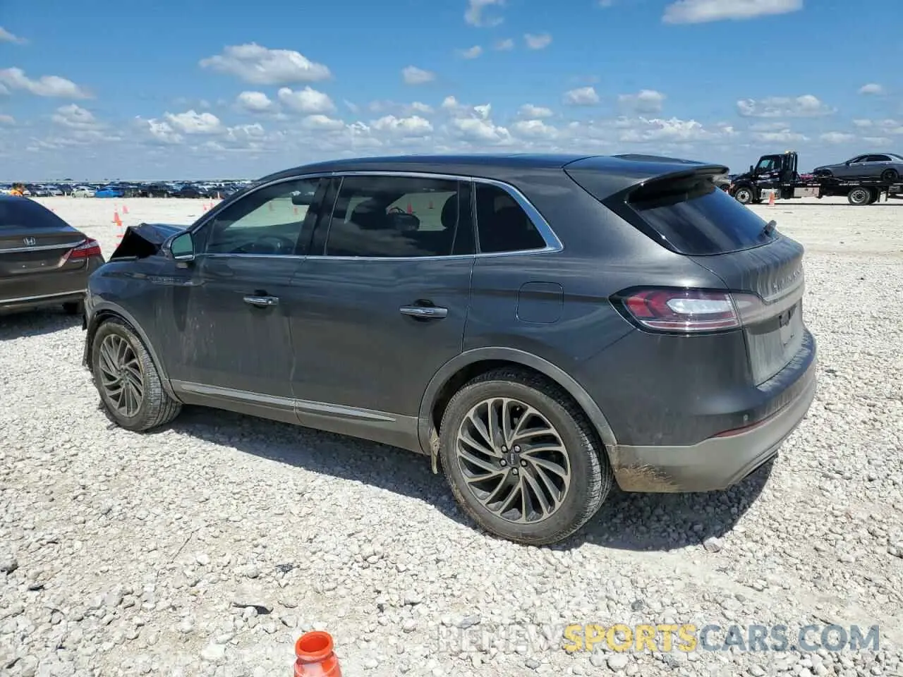 2 fotografías del automóvil dañado 2LMPJ6L9XKBL51296 LINCOLN NAUTILUS 2019