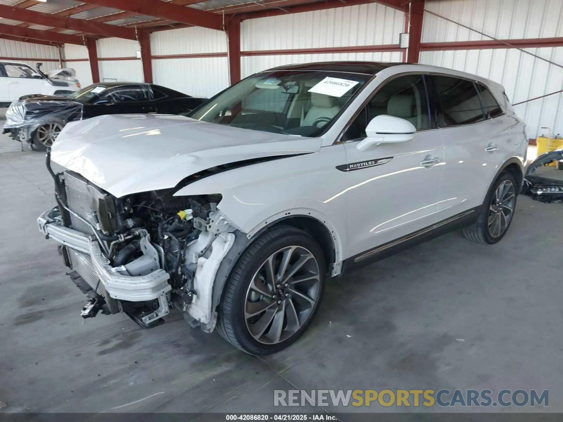 2 fotografías del automóvil dañado 2LMPJ8LP9KBL41756 LINCOLN NAUTILUS 2019